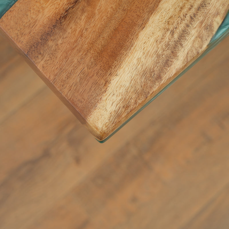 The Custom Green Epoxy Resin River Dining Table is a handcrafted masterpiece featuring agreen epoxy resin river design flowing through a premium natural wood slab. The epoxy resin table top enhances the rich wood tones while providing a high-gloss, long-lasting finish. Ideal as an epoxy resin conference room table or statement dining table, it offers both functionality and artistic appeal. Perfect for modern interiors, this unique epoxy resin wood table brings luxury and craftsmanship into any space.