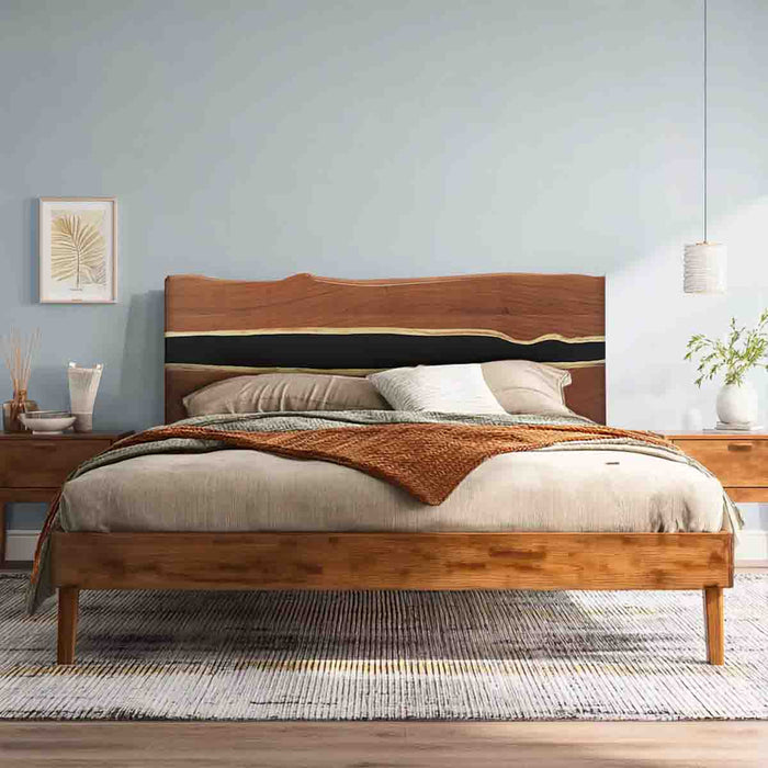 Wooden bed with bedding in a bedroom setting