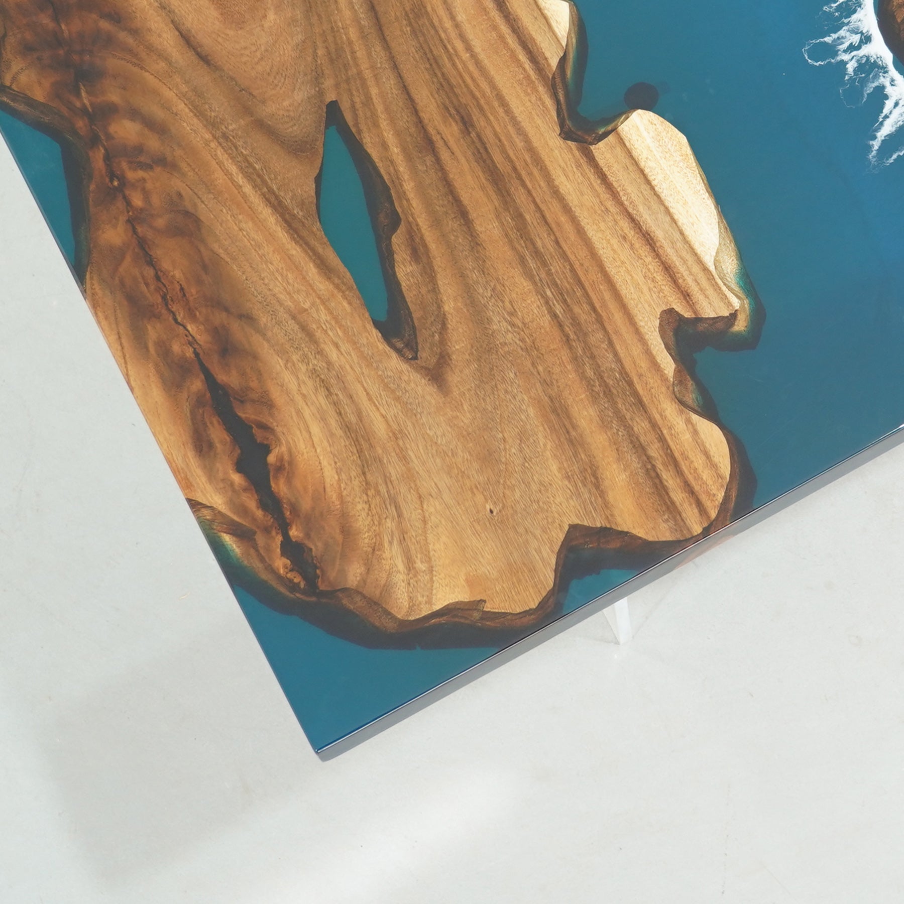Custom-made epoxy resin table for professional spaces.