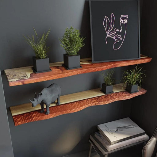 Wooden shelves with decorative items against a dark wall