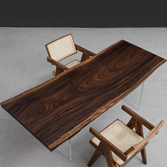 Single slab table handcrafted from century-old South American rain tree wood with rich natural grain.
