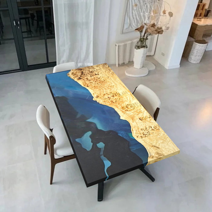 Contemporary poplar wood dining table with translucent deep blue resin and subtle black resin details, durable and stylish.
