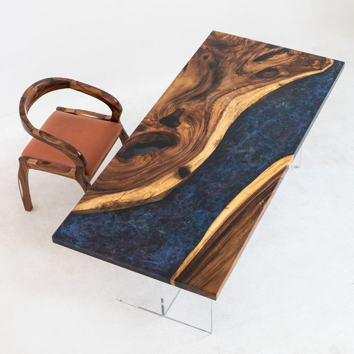 Handcrafted walnut table with starry sky epoxy resin inlay for a unique dining experience.