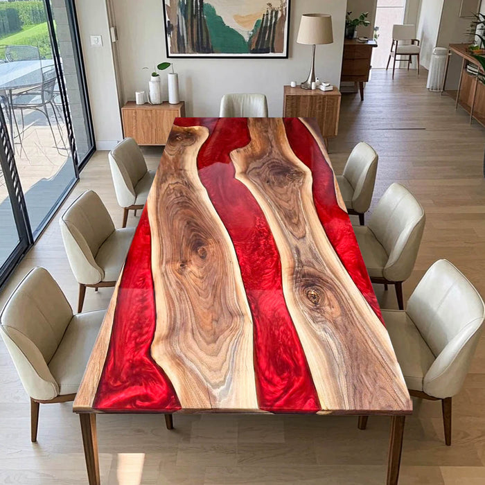 Red epoxy river dining table made from natural walnut wood