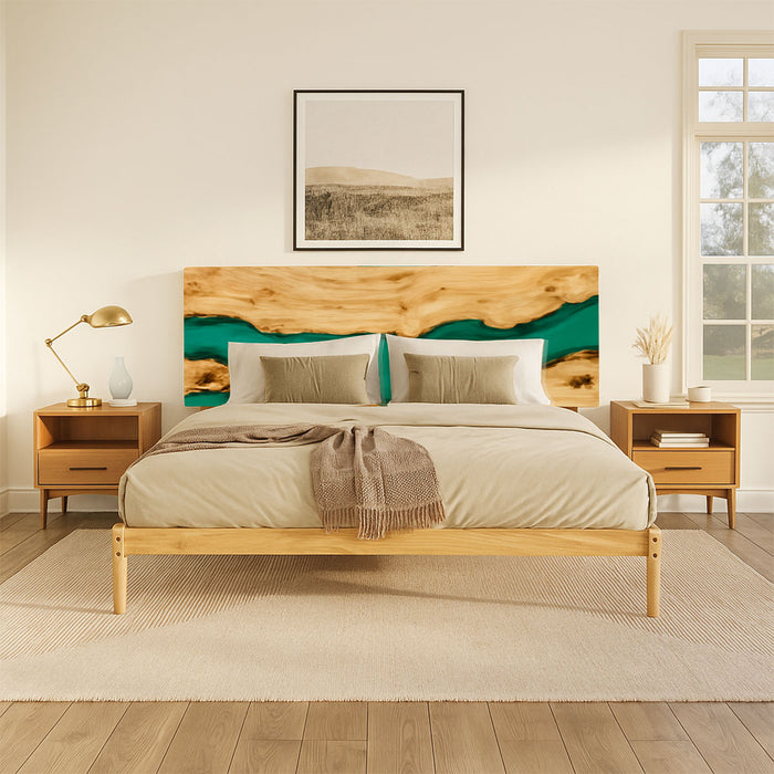 Wooden bed with green accent in a bedroom setting