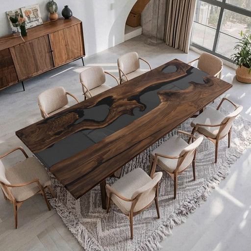 Custom olive wood and black epoxy dining table for luxury interiors