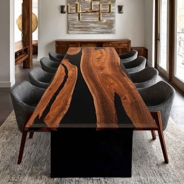 Dining room with a wooden table and gray chairs in a modern interior setting.