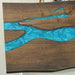 6-Person Black Walnut Epoxy Table in Modern Dining Room