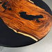 70 inch black epoxy dinning table for a modern dining room