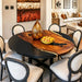 round black walnut dining table with black epoxy resin
