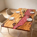 72 x 36 olive wood red swirl epoxy dining table for a modern dining room