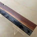 Large black walnut floating wall shelf with gray resin