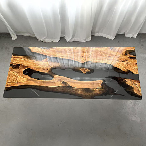 Artistic resin and olive wood table styled in a modern office atrium