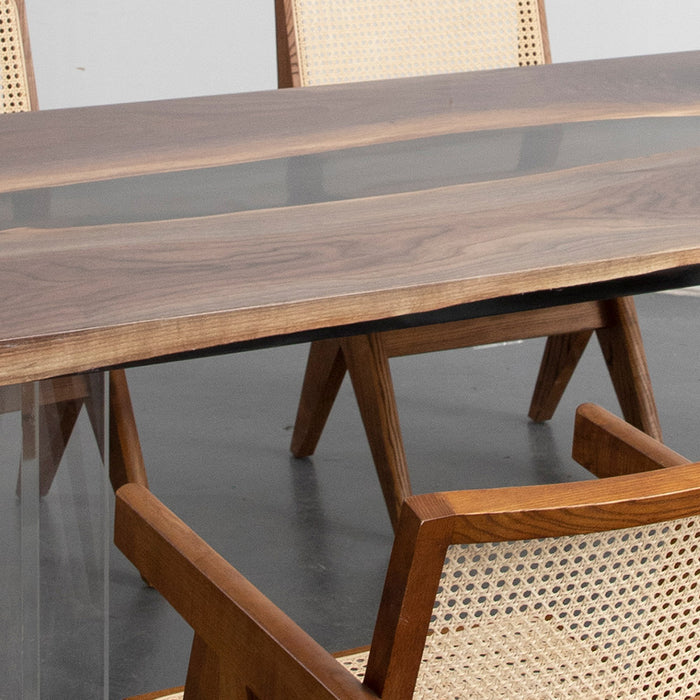 Elegant resin river dining table made of black walnut wood, suited for modern kitchens and coworking cafés.