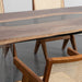 Elegant resin river dining table made of black walnut wood, suited for modern kitchens and coworking cafés.