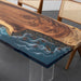 Handcrafted walnut epoxy resin dining table with coastal theme