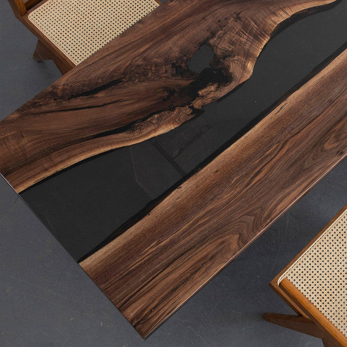 Luxury black walnut epoxy table perfect for upscale dining rooms