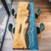 Custom poplar epoxy river table with ocean wave resin