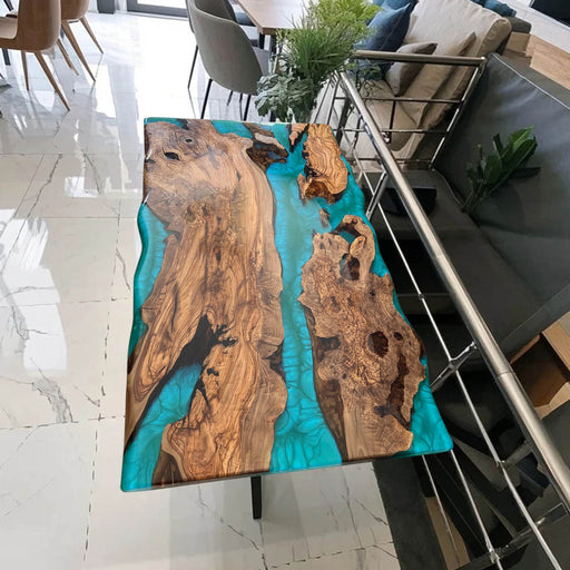 Live edge epoxy river table with rare burl wood and turquoise