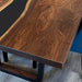 Handmade walnut epoxy table with black river design