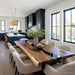 Black walnut live edge epoxy river dining table in modern dining room.