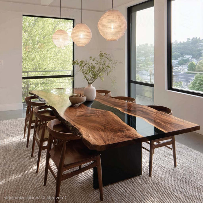 Custom handcrafted black walnut live edge table with black resin.
