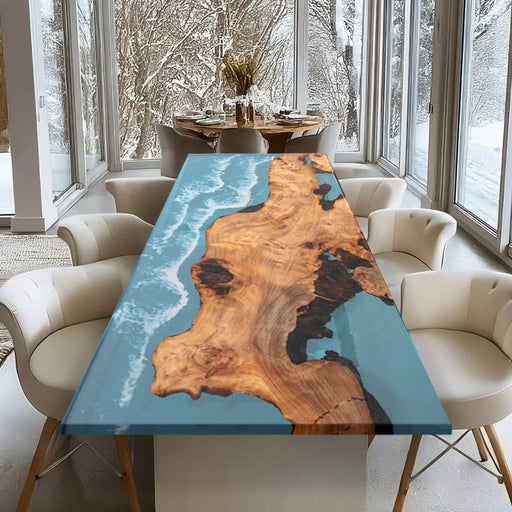 Dining room with a unique wooden table featuring a blue resin design.