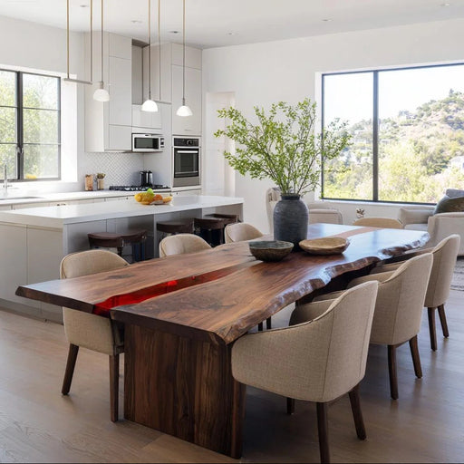 Modern kitchen with a wooden dining table and chairs, featuring a vase with greenery.
