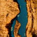 Aerial view of a river flowing between two rocky cliffs with blue water.