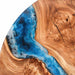 Artistic round river table with walnut and ocean blue resin design