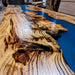 Wooden table with blue resin inlay