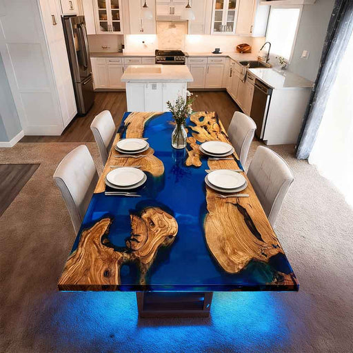 Dining table with blue resin and wooden design in a kitchen setting
