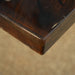 The Custom Black Epoxy Smooth Dining Table is a masterpiece, blending the raw beauty of nature with a modern minimalist style. The tabletop is crafted from carefully selected high-quality wood, paired with deep black resin that flows like a river. The intricate details of the resin flow are vibrant and unique, showcasing the perfect union of craftsmanship and nature. With its sleek design, it effortlessly complements both modern and classic decor, becoming the focal point of any space. The sturdy legs provi