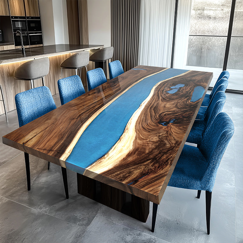 Blue epoxy resin river table featuring a high-gloss finish and natural wood slab, perfect for dining or conference rooms