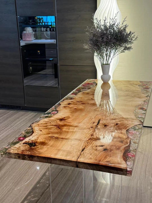 Handcrafted diy epoxy table with flowers.