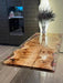 Handcrafted diy epoxy table with flowers.