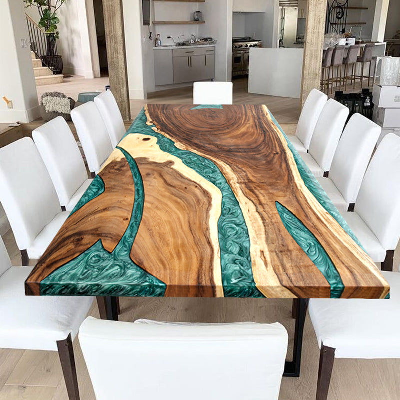 The Custom Green Epoxy Resin River Dining Table is a handcrafted masterpiece featuring agreen epoxy resin river design flowing through a premium natural wood slab. The epoxy resin table top enhances the rich wood tones while providing a high-gloss, long-lasting finish. Ideal as an epoxy resin conference room table or statement dining table, it offers both functionality and artistic appeal. Perfect for modern interiors, this unique epoxy resin wood table brings luxury and craftsmanship into any space. 