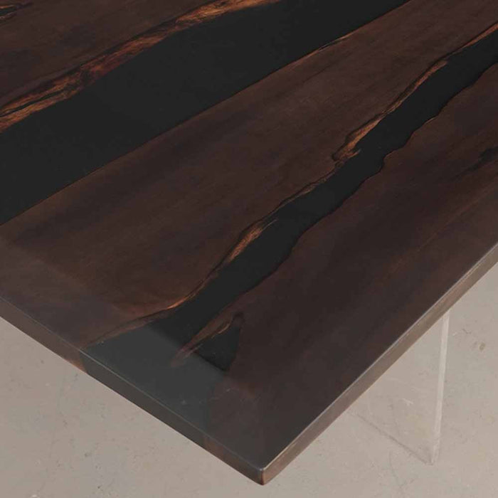 Dark wooden table with a glossy finish on a light background