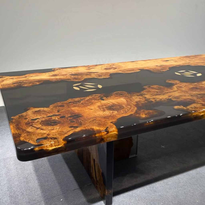 Live edge golden camphor epoxy dining table showcasing organic edges and unique hardwood character.