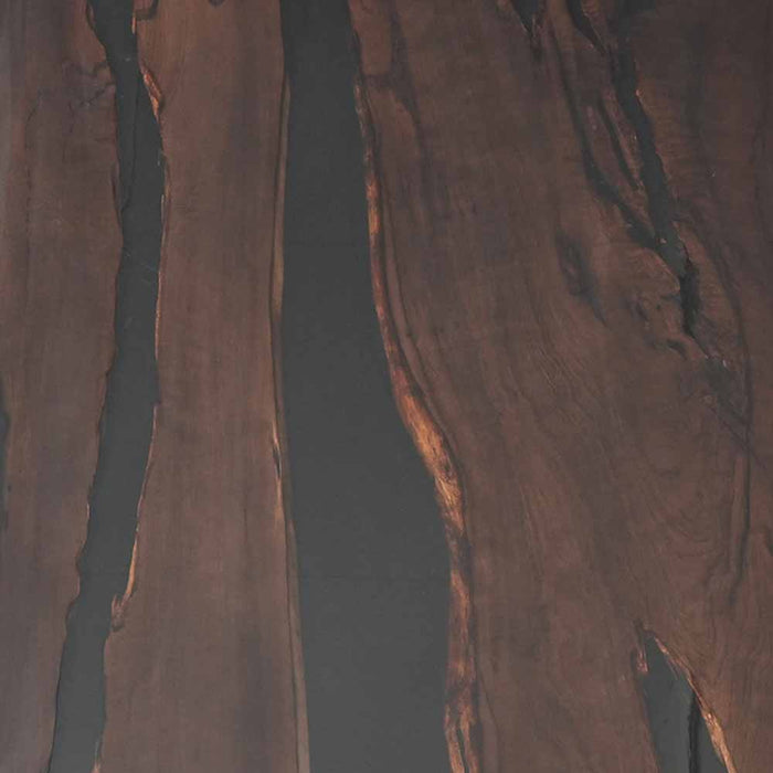 Aerial view of a deep canyon with steep rock walls.