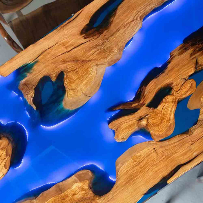 Wooden table with blue resin inlay