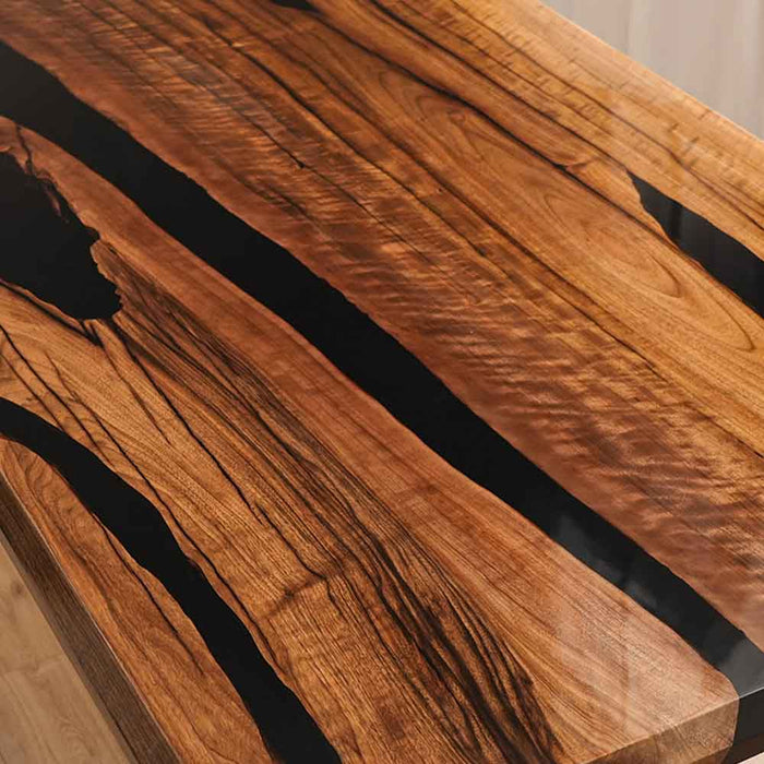 Close-up of a wooden surface with black resin inlay