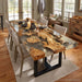 Modern square epoxy olive wood dining table in dining space