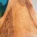 Luxury black walnut epoxy dinning table in an elegant dining area