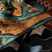 Close up of burl wood texture with glossy green epoxy