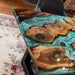 Modern dining room featuring burl wood epoxy dining table