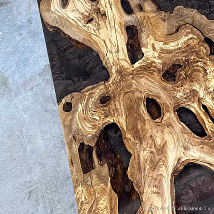 Close up of olive wood grain with black epoxy swirl