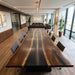 Close up of black walnut wood grain and matte black epoxy surface