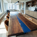Multi-purpose blue epoxy conference table for medium offices or studios