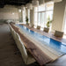 Detailed view of natural walnut texture with flowing wave resin